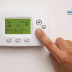 Person using Programmable and Smart Thermostat