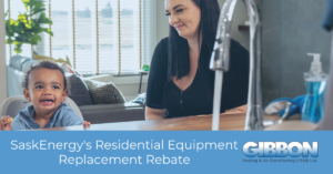 Child and woman sitting at table, words SaskEnergy's Residential Equipment Replacement Rebate on the bottom